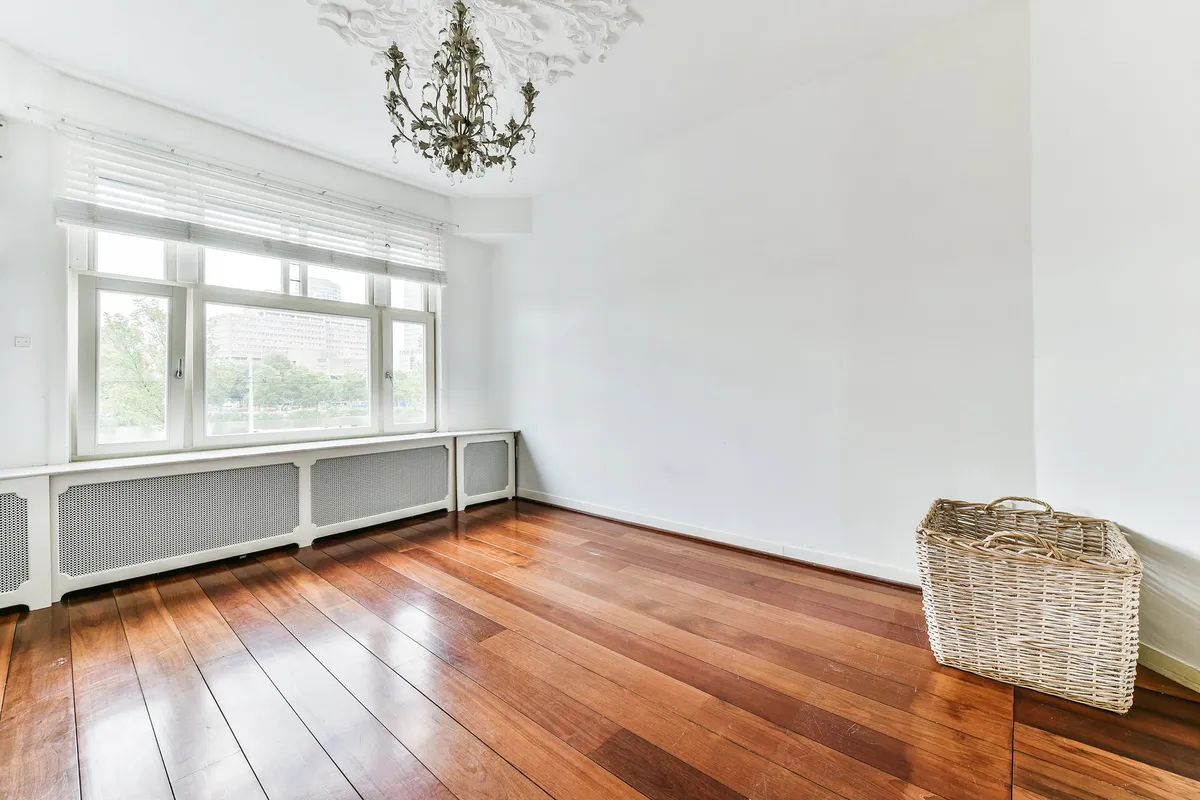 Empty interior of a house, illustrating the need for floor restoration myths to be debunked.